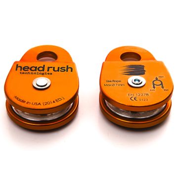 front and back of orange zipSTOP redirection zip line pulley for zip line redirection lines