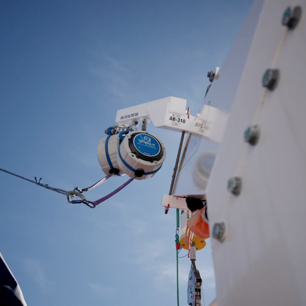 Worker using TruBlue SafeLine to demonstrate controlled descent advantages in maritime training