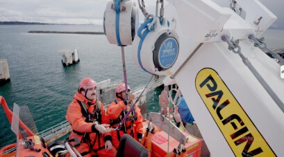 Worker performing emergency descent training using TruBlue SafeLine system