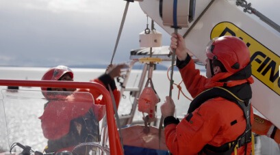 Maritime crew conducting lifeboat launch training using TruBlue SafeLine