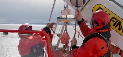 Maritime crew conducting lifeboat launch training using TruBlue SafeLine